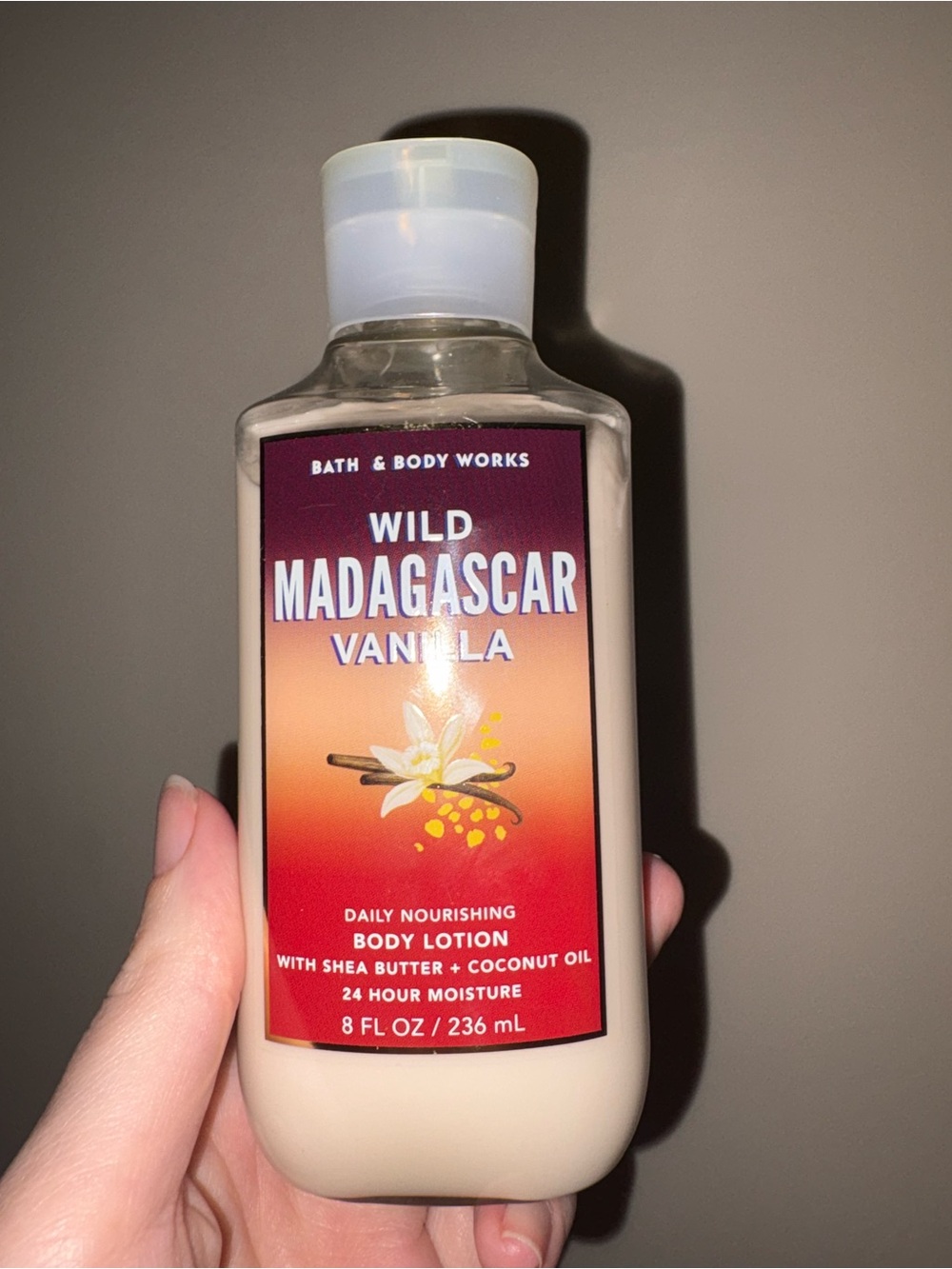 Bath & Body Works Wild Madagascar Vanilla Lotion - Cream & Red-Orange Label